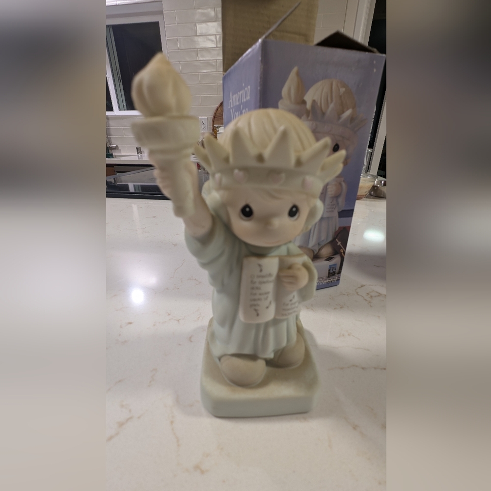 Enesco Porcelain Figurine with Crown and Torch